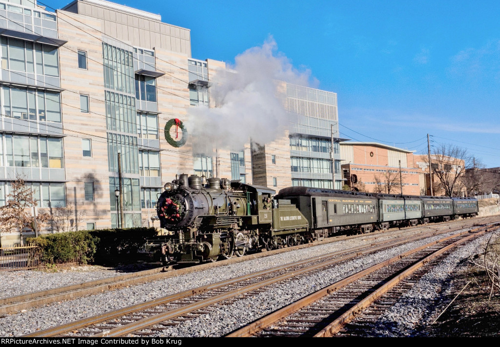 BLW 26 with the IHS Santa Train passing the University of Scranton